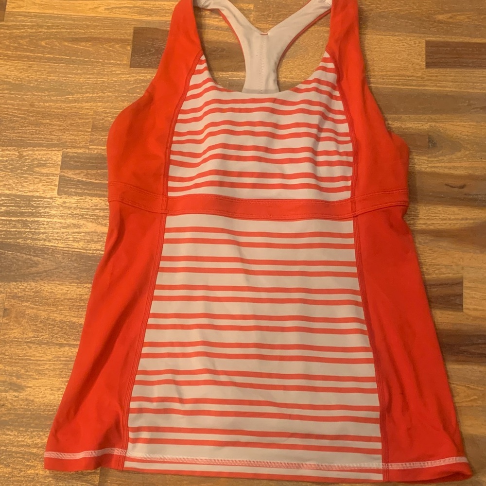 Two Lululemon Like New striped workout tops. Both for $9.